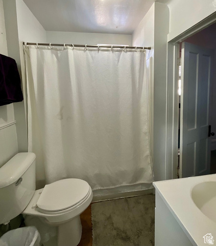 495 North Main Street Beaver, UT 84713 - Photo 10 of 18 Bathroom featuring vanity and curtained shower
