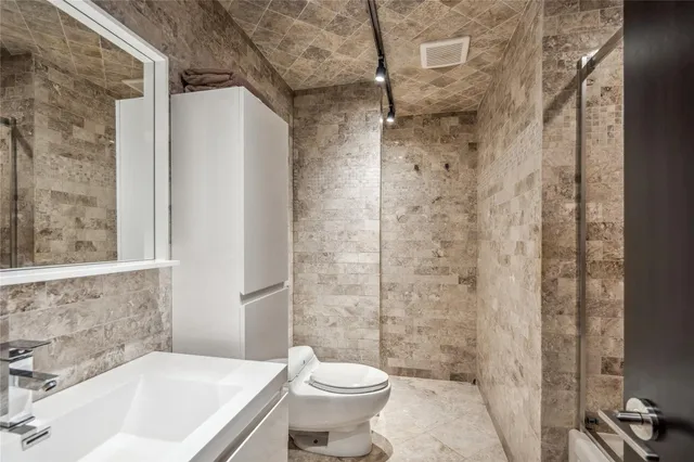 a view of a two chairs in the deck