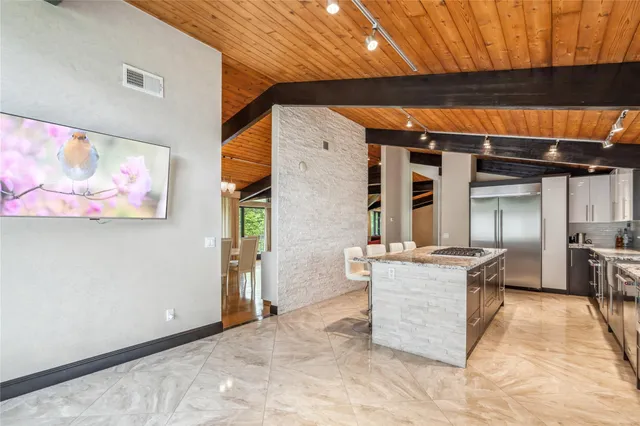 a kitchen with a stove and a sink