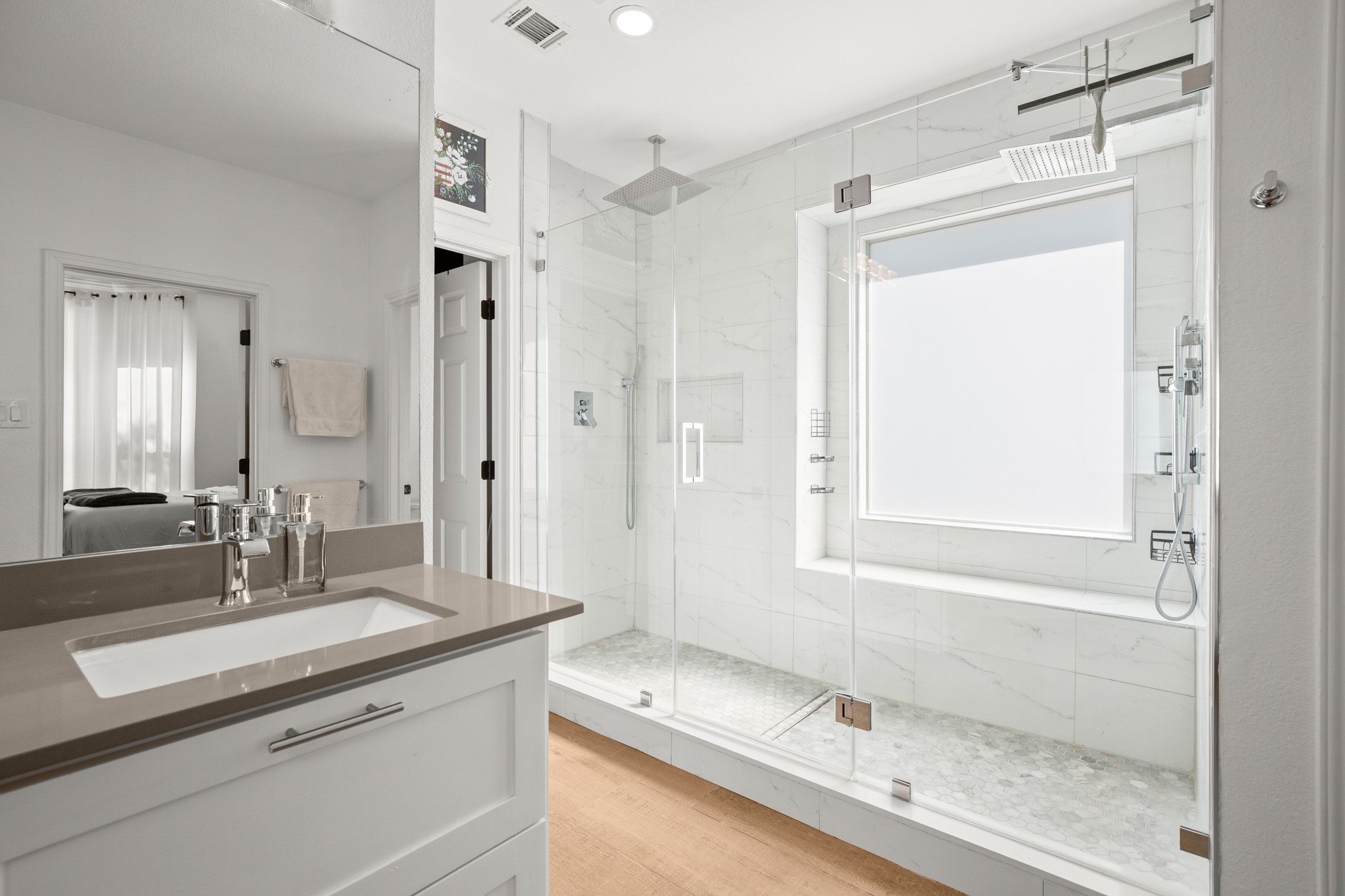314 Ridge View Drive Georgetown, TX 78628 - Photo 11 of 40 The oversized frameless shower is wrapped in floor to ceiling tile and finished with multiple shower fixtures and a rain shower, bringing a little resort worthy indulgence into the daily routine.