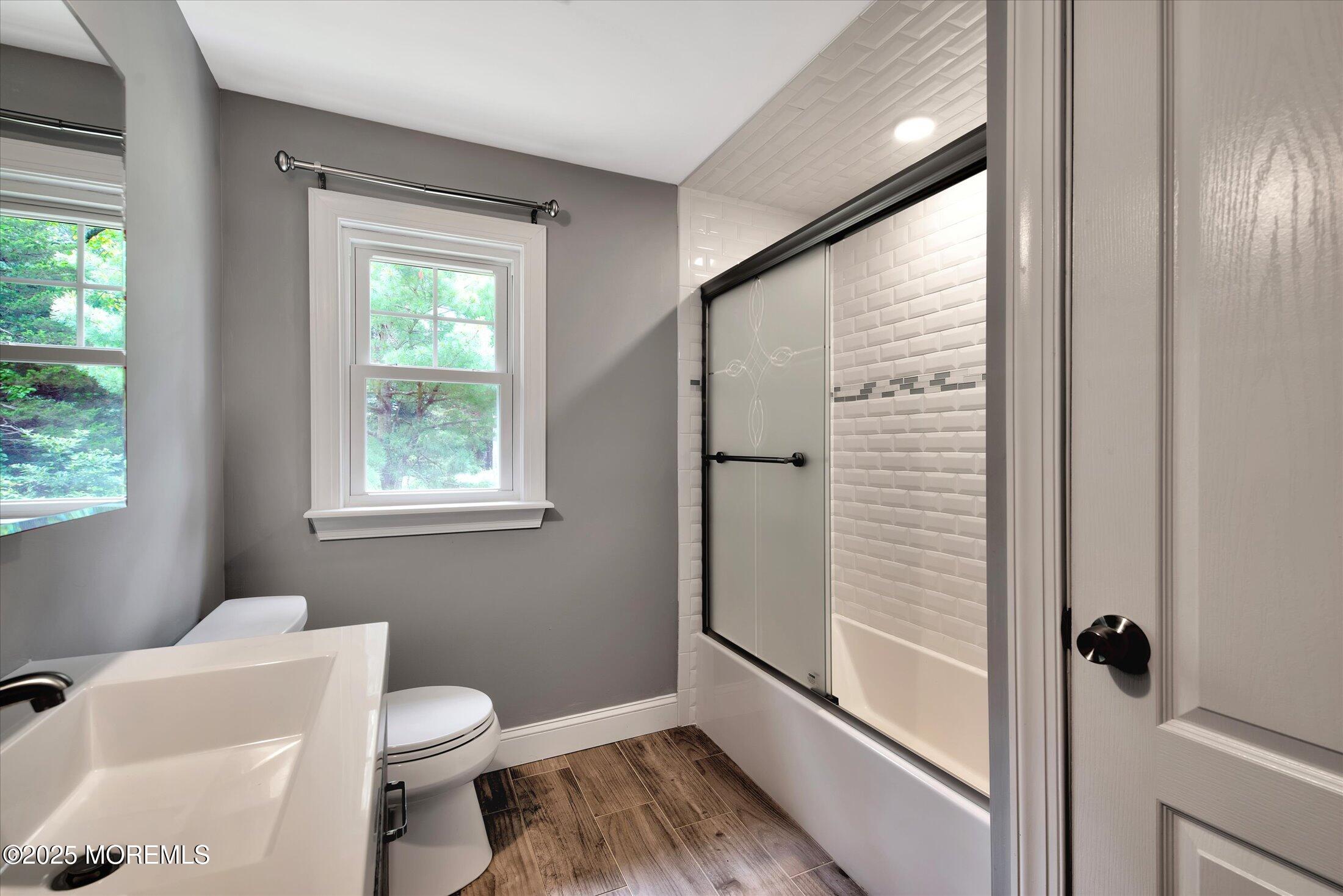 88 Dutch Lane Road Marlboro, NJ 07746 - Photo 26 of 35 a bathroom with a toilet and a shower