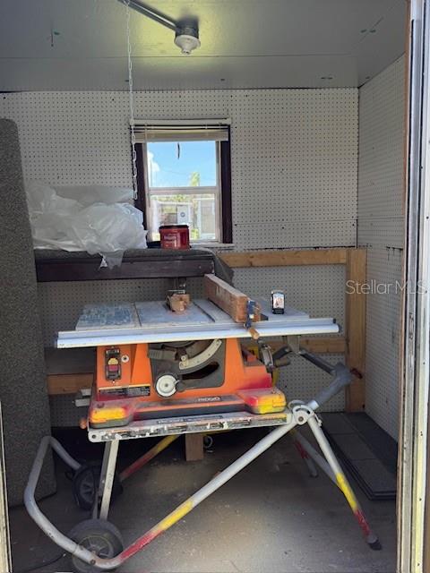 605 Michigan Boulevard, Unit 100 Dunedin, FL 34698 - Photo 20 of 20 a room with chairs