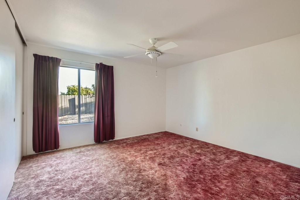 404 Compass Road Oceanside, CA 92054 - Photo 12 of 26 an empty room with windows and closet