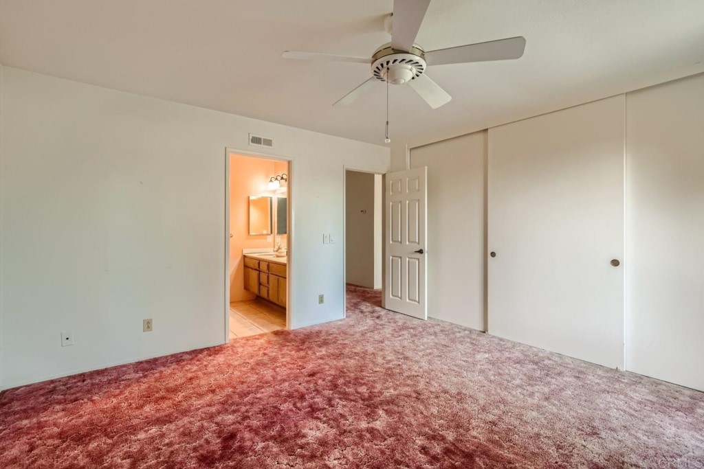 404 Compass Road Oceanside, CA 92054 - Photo 13 of 26 a view of a big room with a chandelier fan