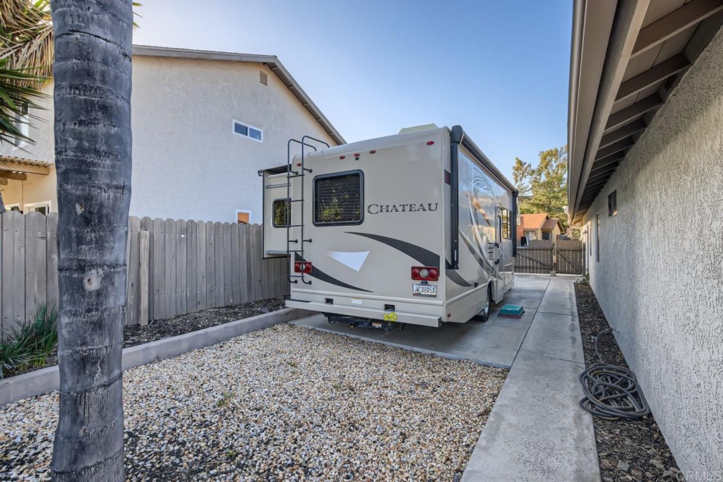 404 Compass Road Oceanside, CA 92054 - Photo 20 of 26 a car parked in front of a house