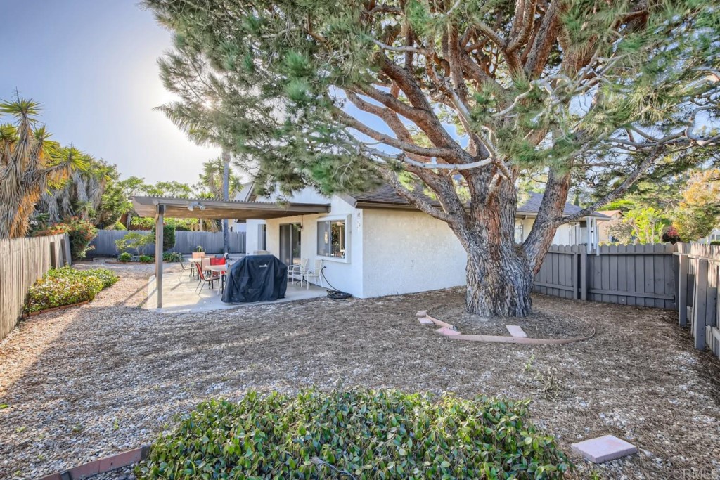 404 Compass Road Oceanside, CA 92054 - Photo 25 of 26 a view of a house with backyard and a tree