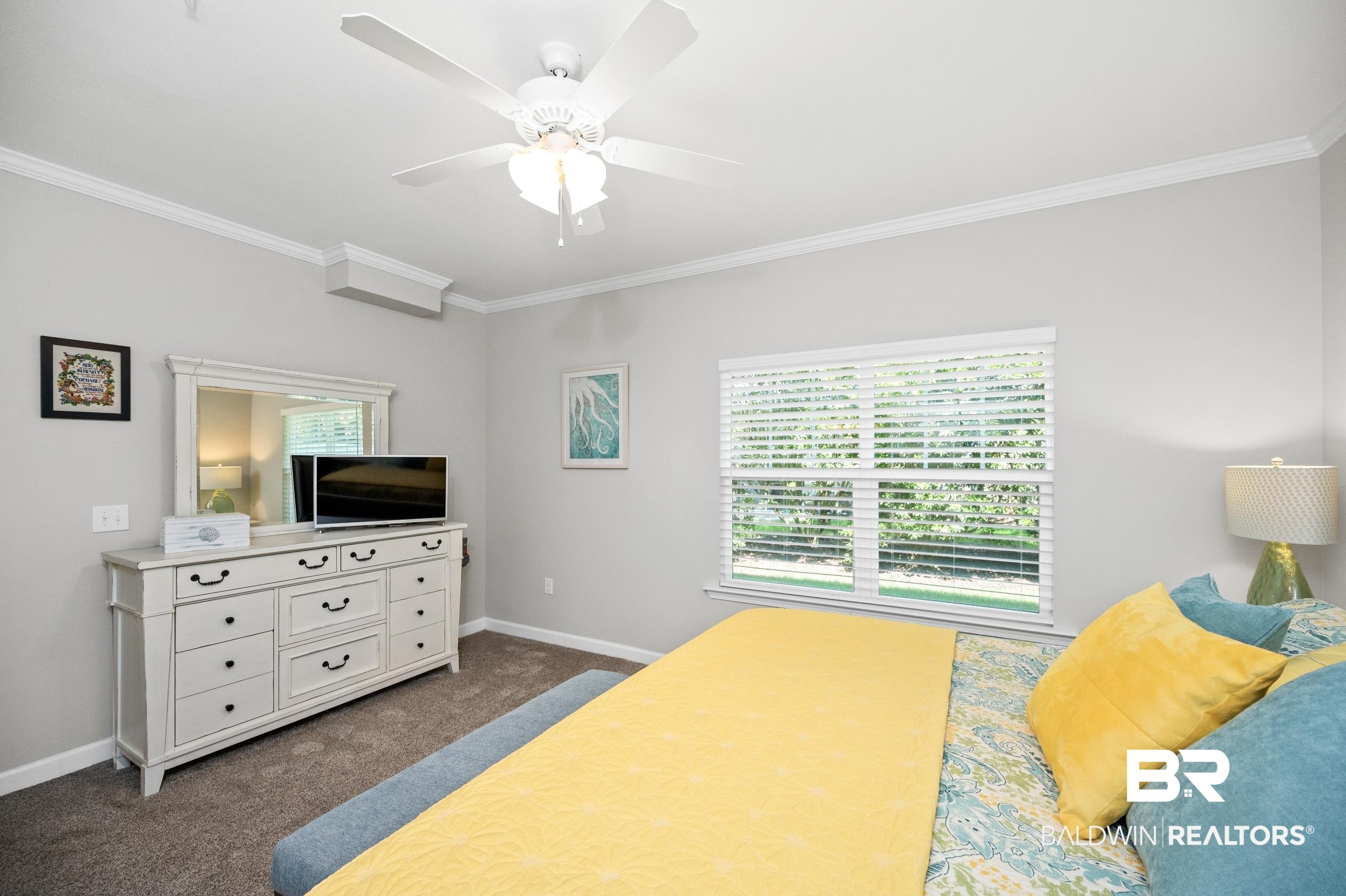 430 West Fort Morgan Road, Unit 1902 Gulf Shores, AL 36542 - Photo 20 of 59 Carpeted bedroom featuring ceiling fan and crown molding