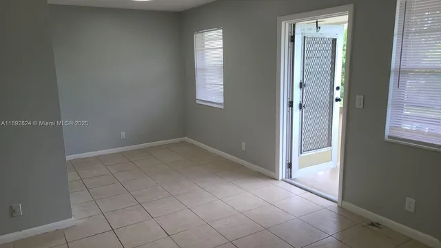 an empty room with windows