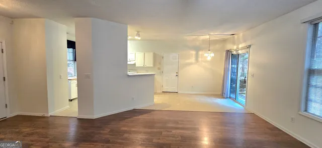 a view of entryway with wooden floor