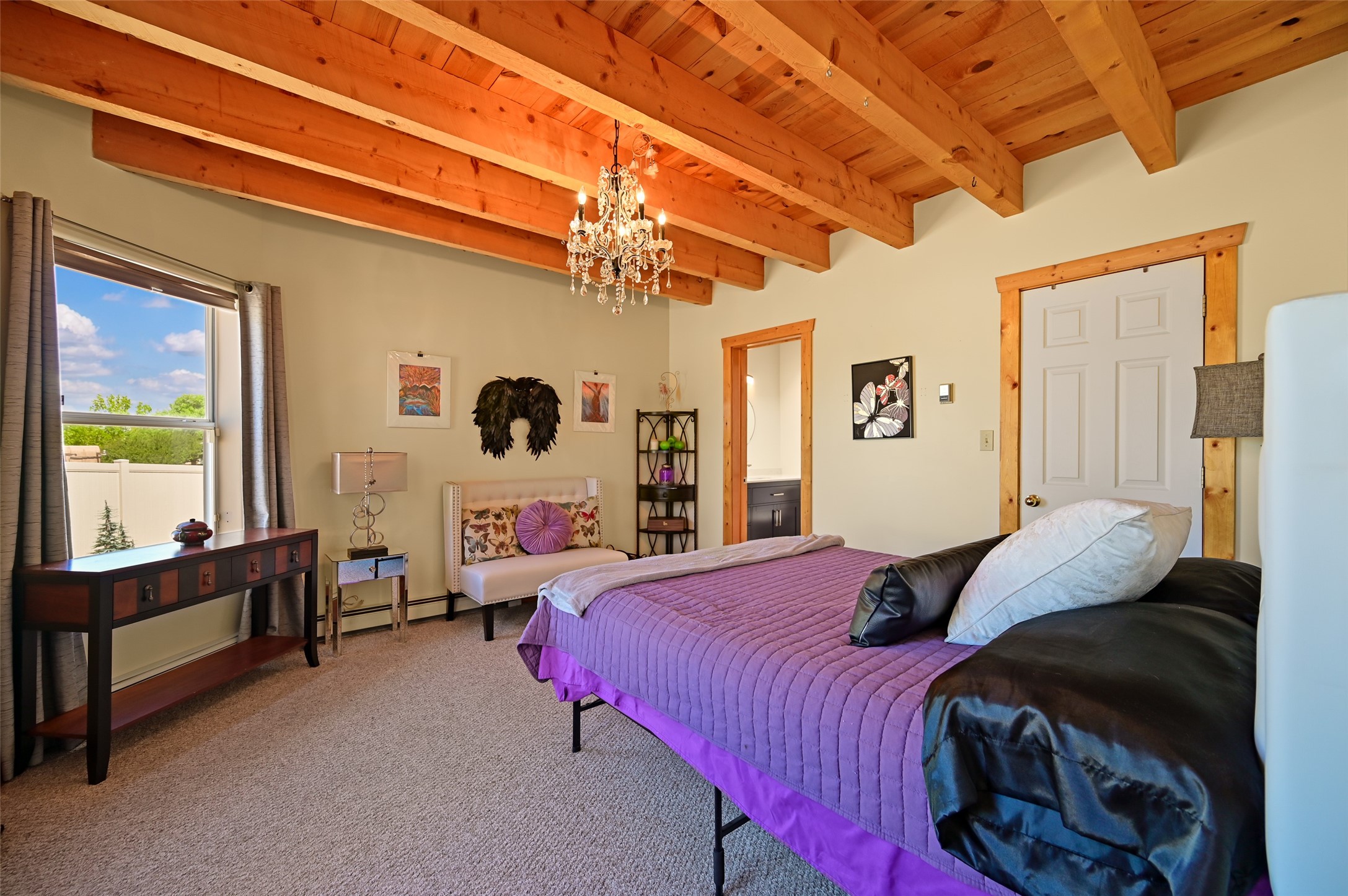 7516 Sagebrush Road Santa Fe, NM 87507 - Photo 10 of 27 Another view of primary with glass door and lots of natural light