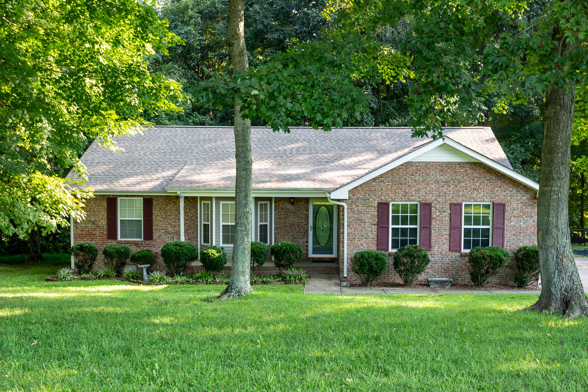 1649 Gratton Road Clarksville, TN 37043 - Photo 1 of 23 a view of a house with a yard and potted plants