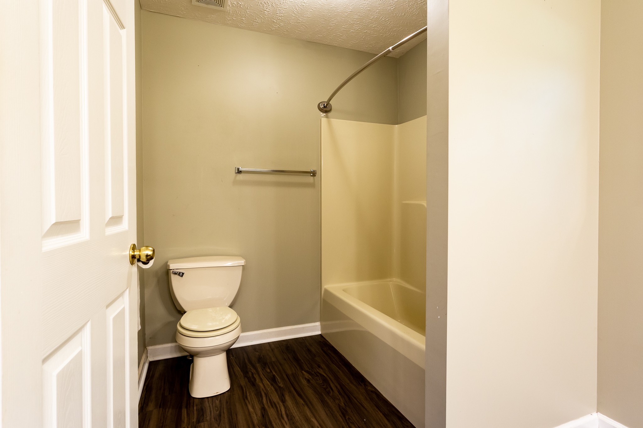 1649 Gratton Road Clarksville, TN 37043 - Photo 13 of 23 a white toilet sitting next to a bathroom sink