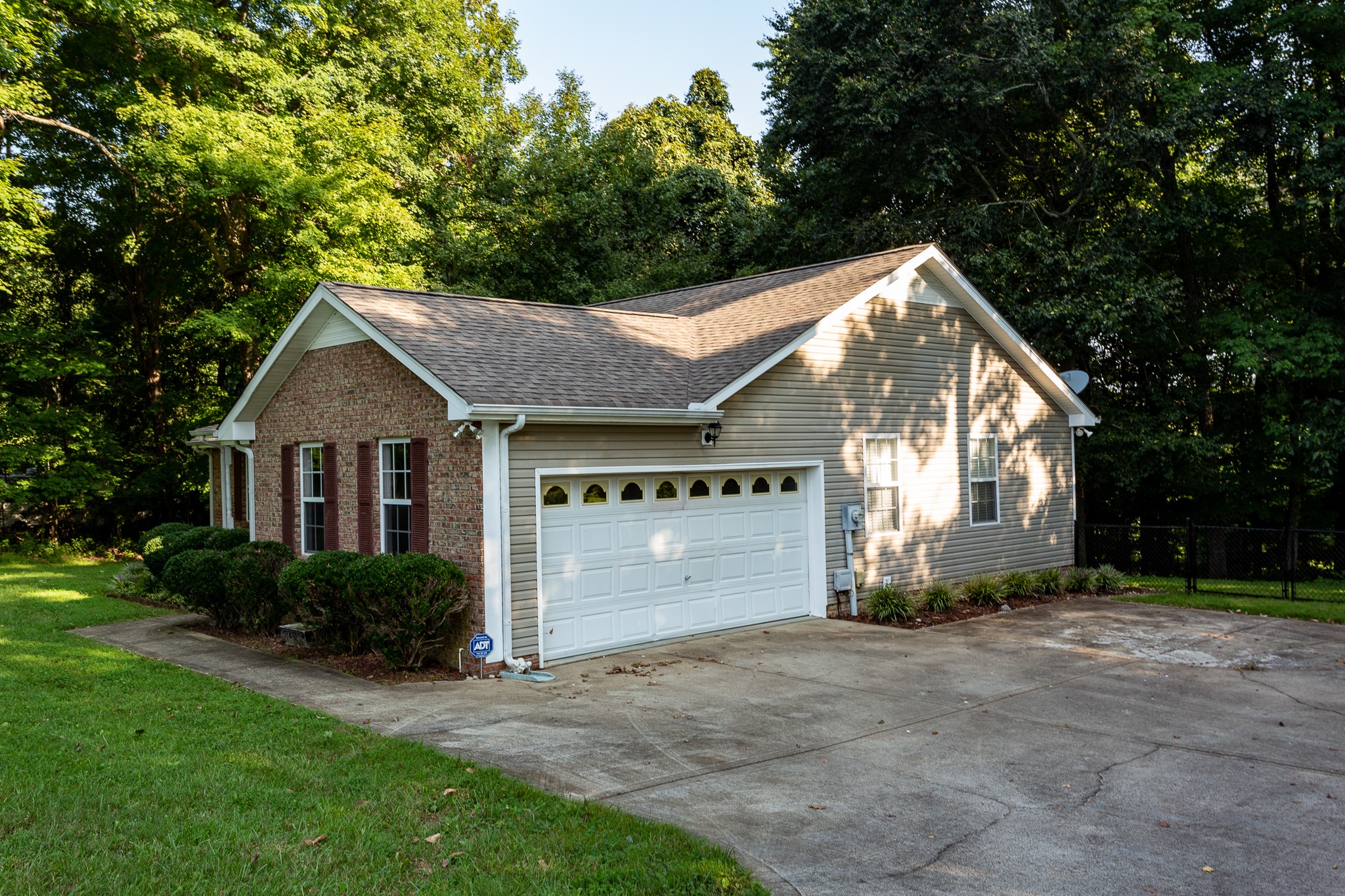 1649 Gratton Road Clarksville, TN 37043 - Photo 18 of 23 a front view of a house with a yard and garage