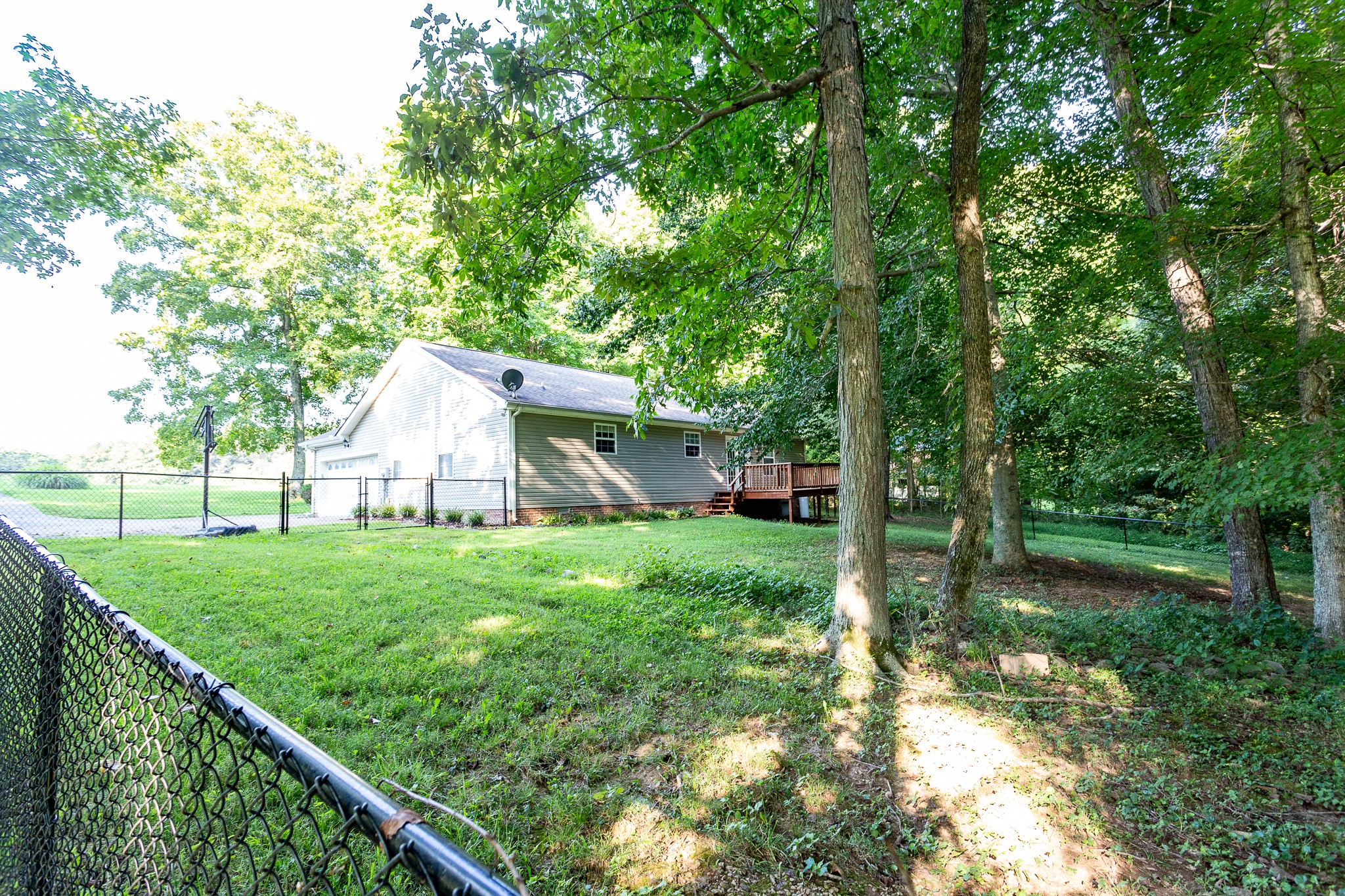 1649 Gratton Road Clarksville, TN 37043 - Photo 22 of 23 a view of a house with backyard and garden