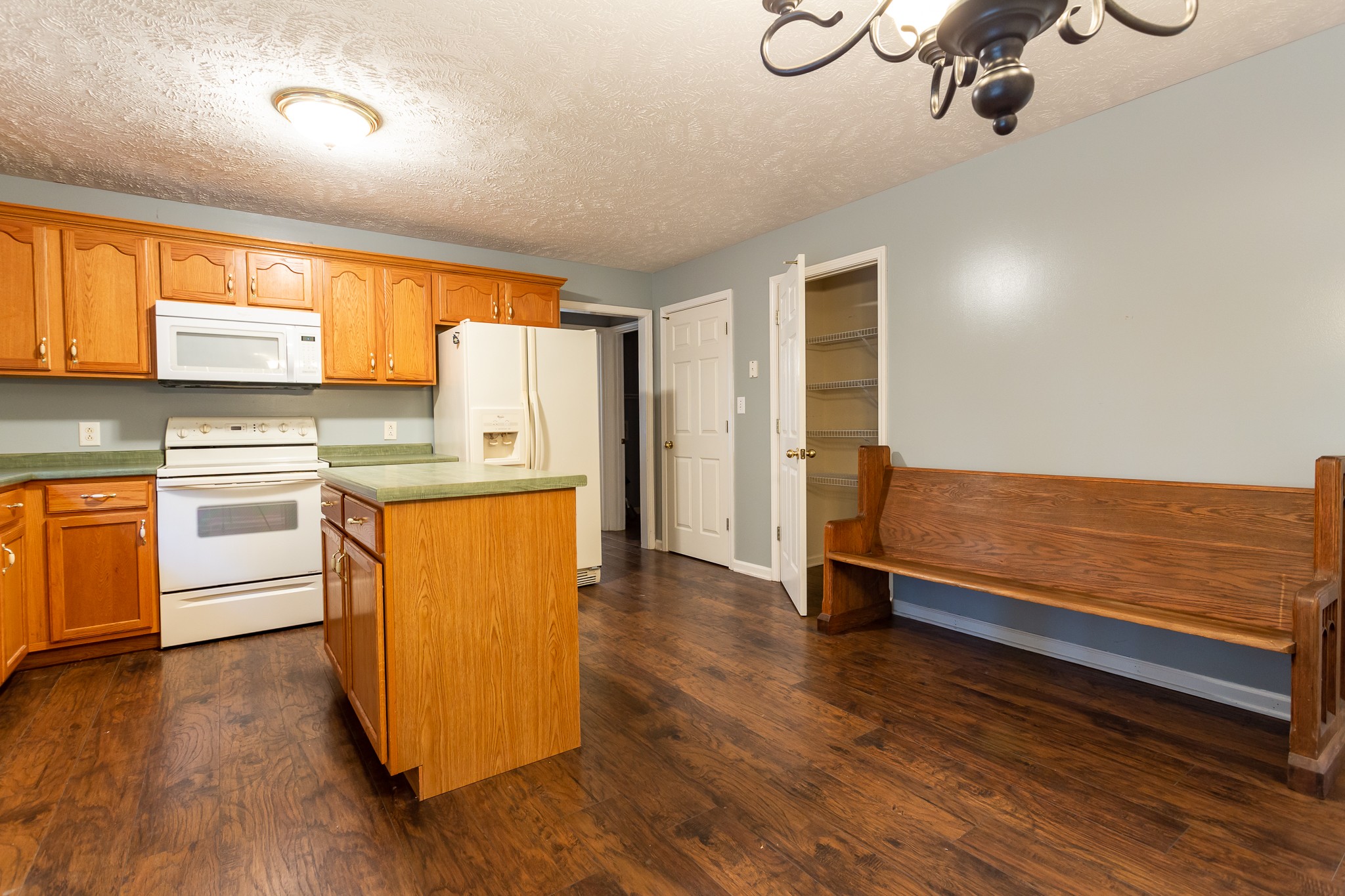 1649 Gratton Road Clarksville, TN 37043 - Photo 7 of 23 a view of kitchen with wooden floor and electronic appliances