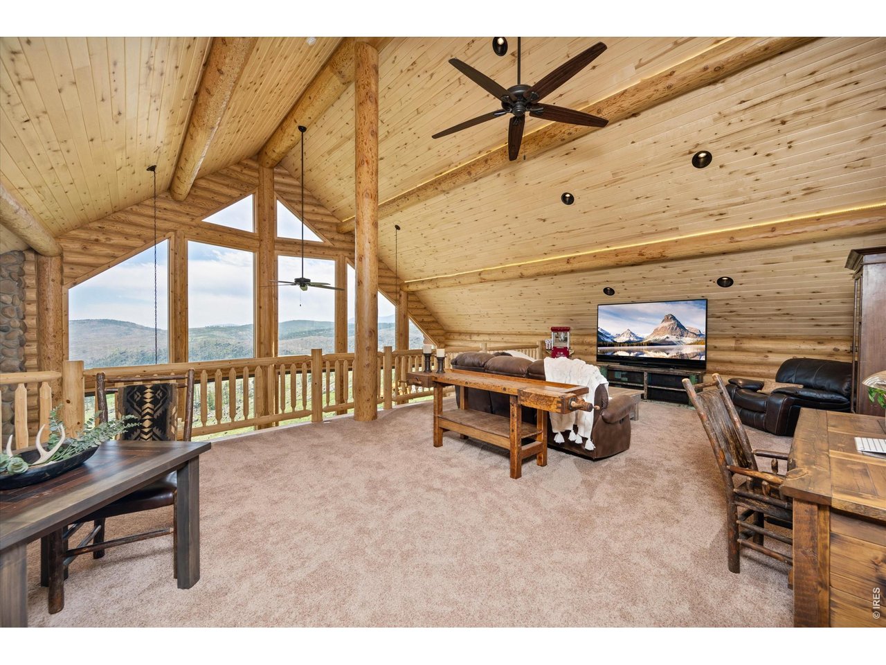 4119 Davis Ranch Road Bellvue, CO 80512 - Photo 27 of 47 The loft was made for relaxing or entertaining. Room for a pool table, game room, or office