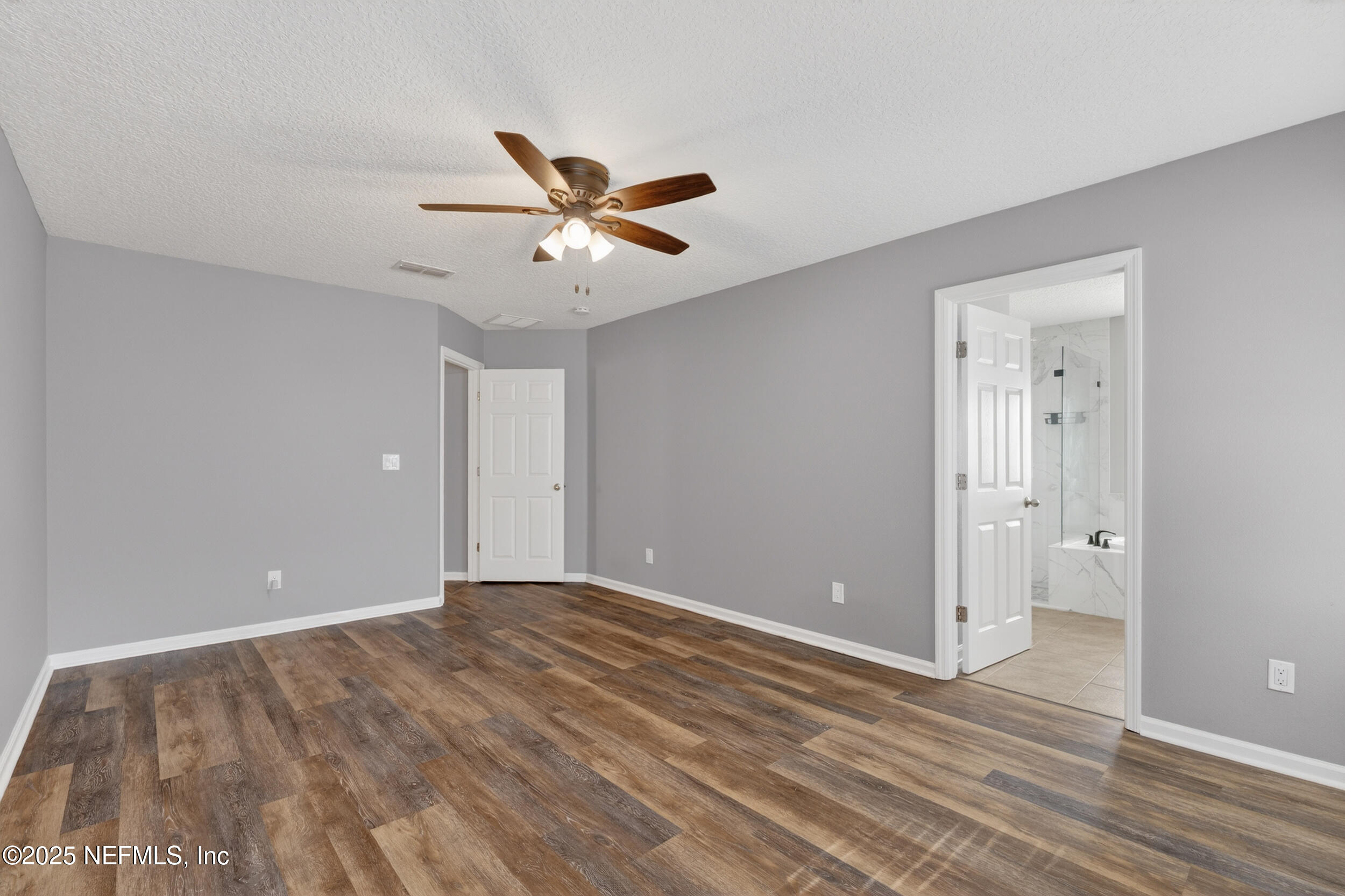 1165 Carmona Place St. Augustine, FL 32092 - Photo 10 of 31 a view of an empty room and wooden floor