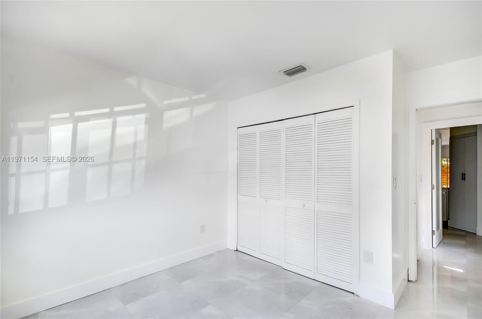 12909 Southwest 61st Terrace Miami, FL 33183 - Photo 15 of 36 a view of an empty room