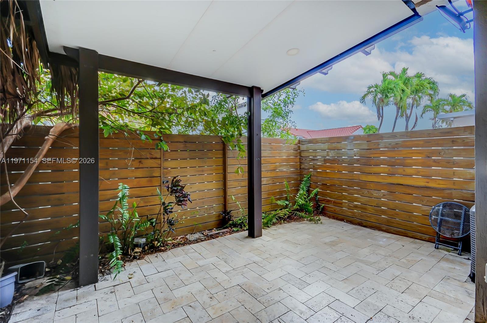 12909 Southwest 61st Terrace Miami, FL 33183 - Photo 4 of 36 a view of a garden from a room