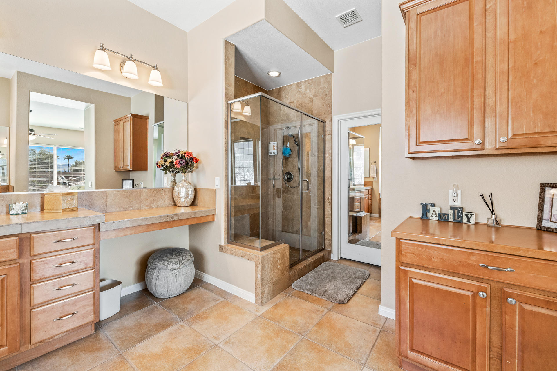 80445 Paria Way Indio, CA 92201 - Photo 27 of 70 a bathroom with a sink a vanity and a mirror