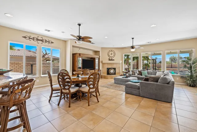 a view of a chairs and table in the patio