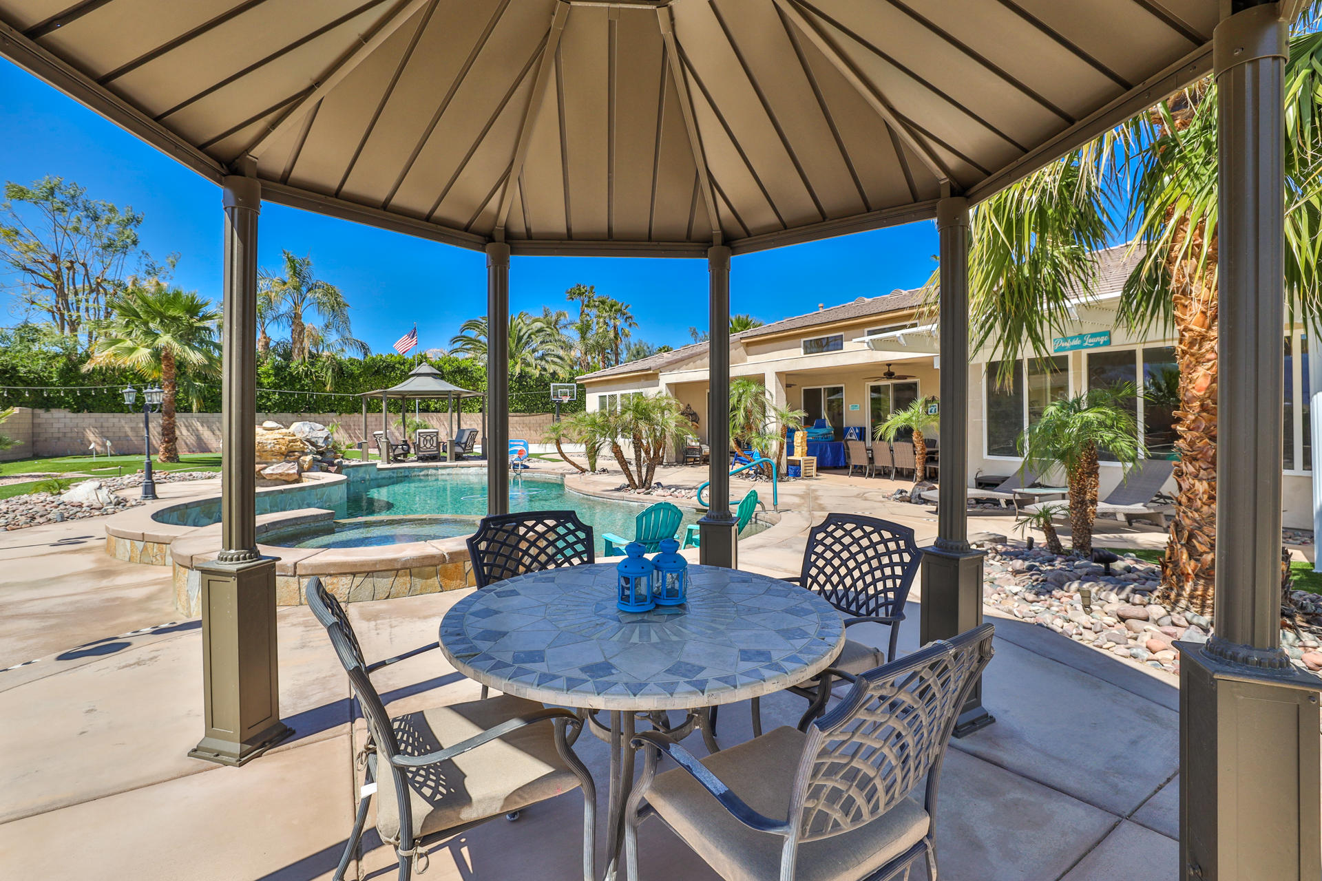 80445 Paria Way Indio, CA 92201 - Photo 38 of 70 a view of an outdoor sitting area with furniture and balcony