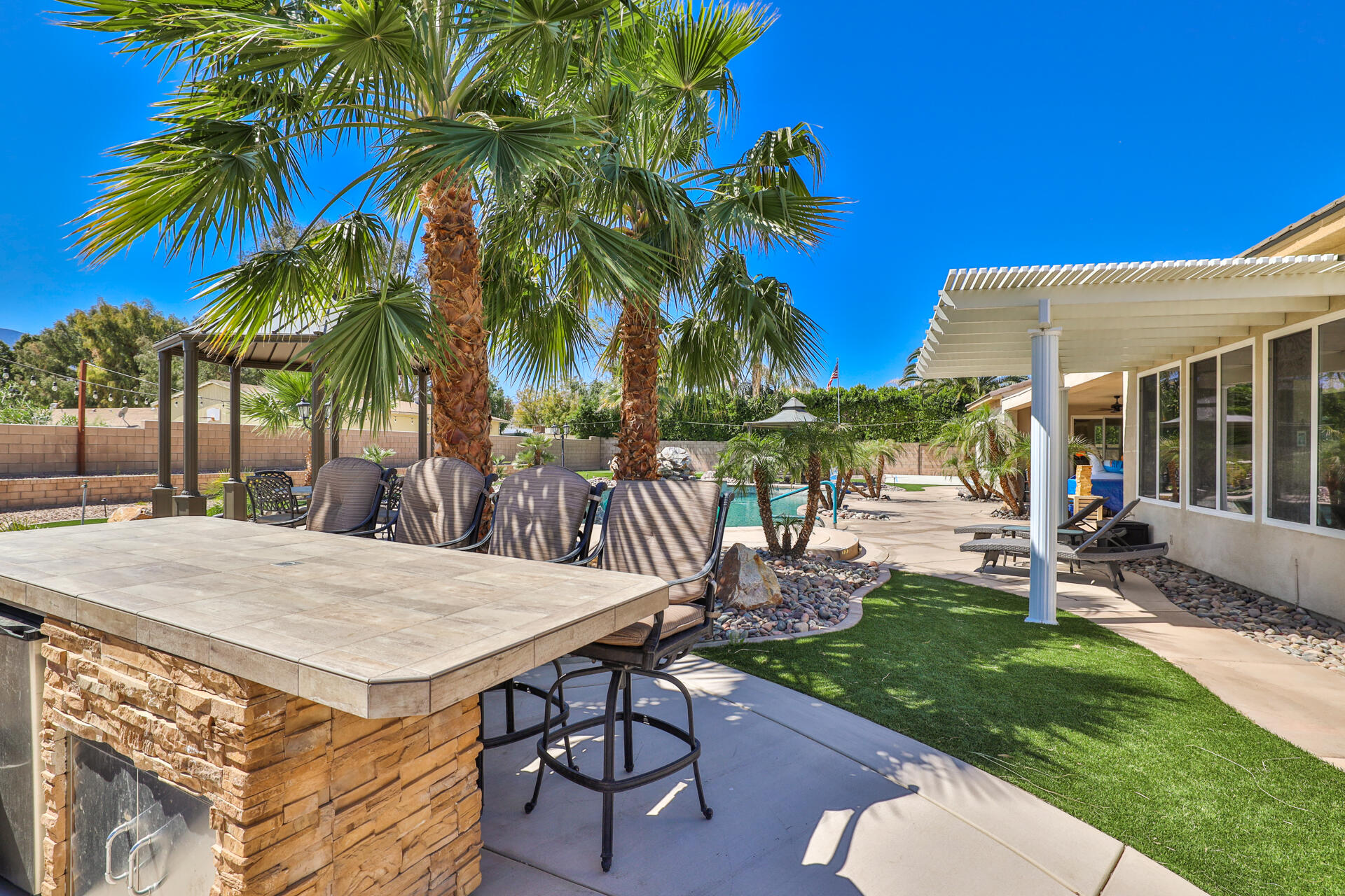 80445 Paria Way Indio, CA 92201 - Photo 42 of 70 a view of a backyard with a patio