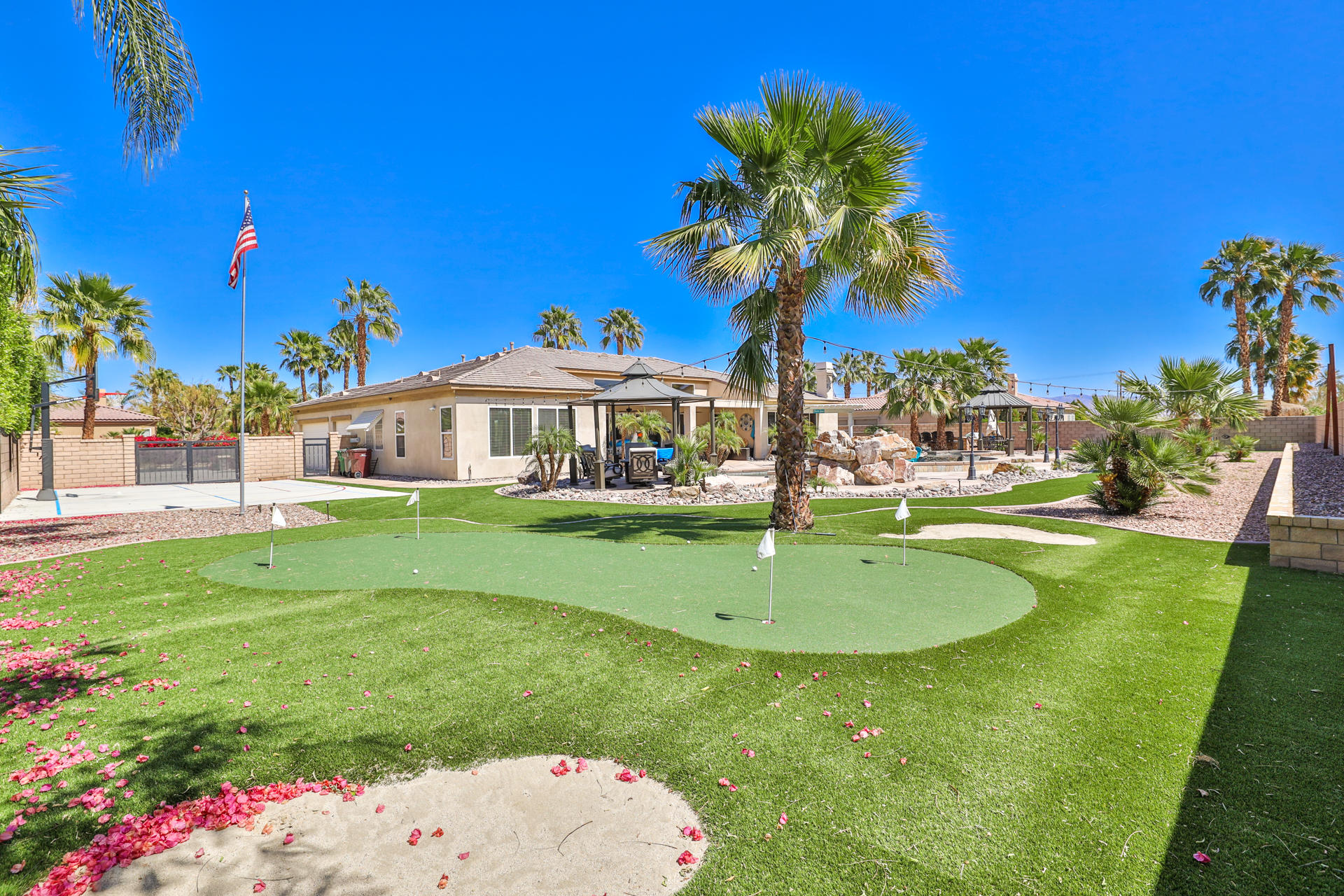 80445 Paria Way Indio, CA 92201 - Photo 45 of 70 a house with garden in front of it