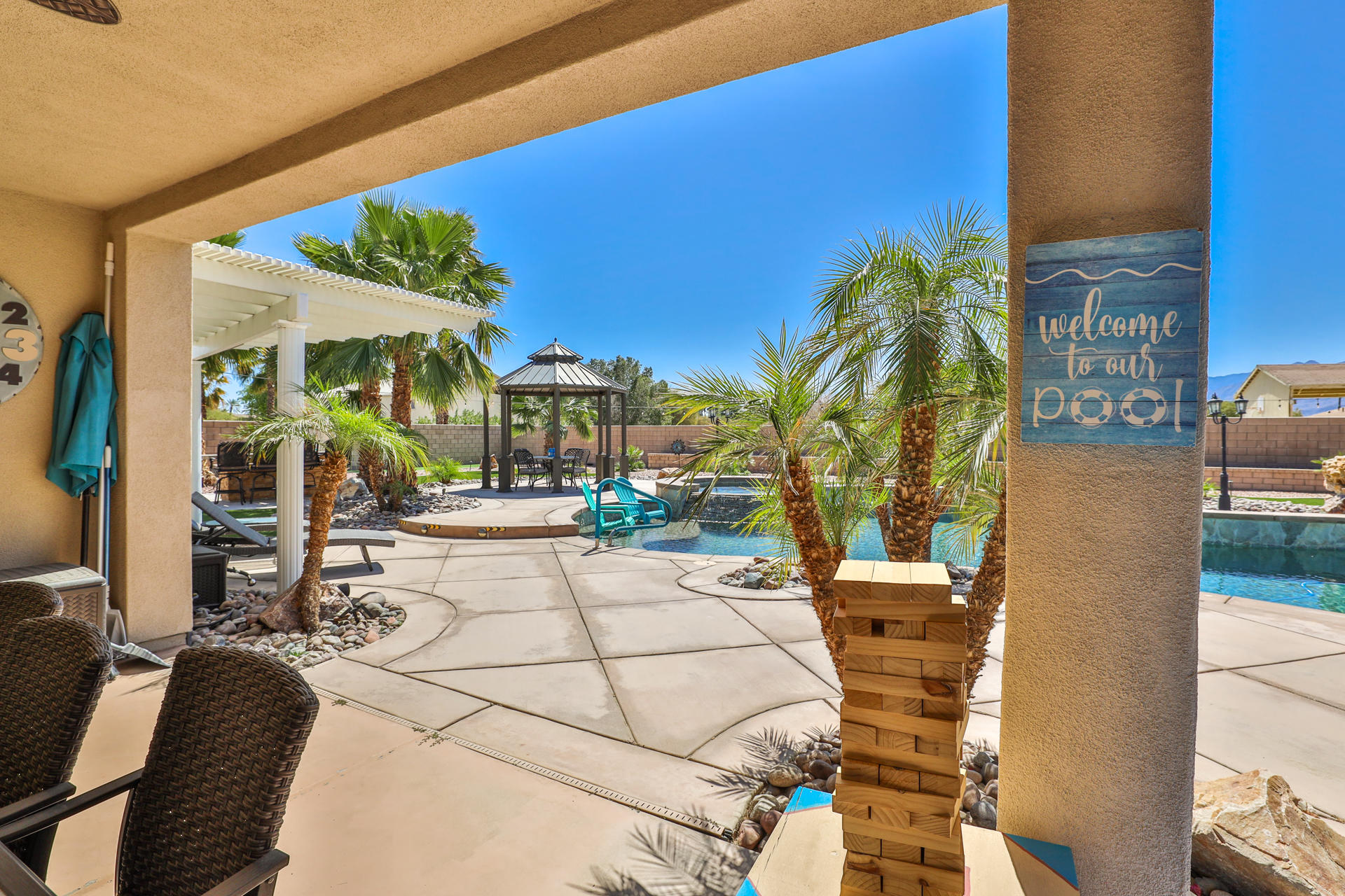 80445 Paria Way Indio, CA 92201 - Photo 54 of 70 a view of a house with backyard and sitting area