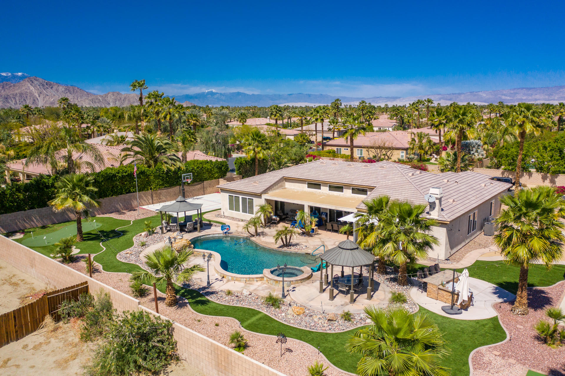 80445 Paria Way Indio, CA 92201 - Photo 61 of 70 an aerial view of residential houses with outdoor space and street view