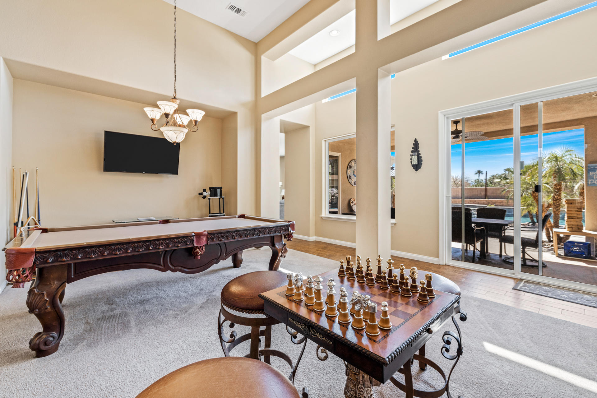 80445 Paria Way Indio, CA 92201 - Photo 7 of 70 a living room with furniture and a flat screen tv