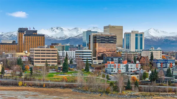 a view of a city with tall buildings