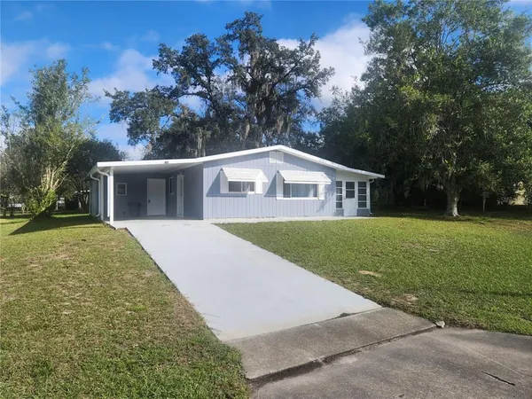 a view of house with outdoor space