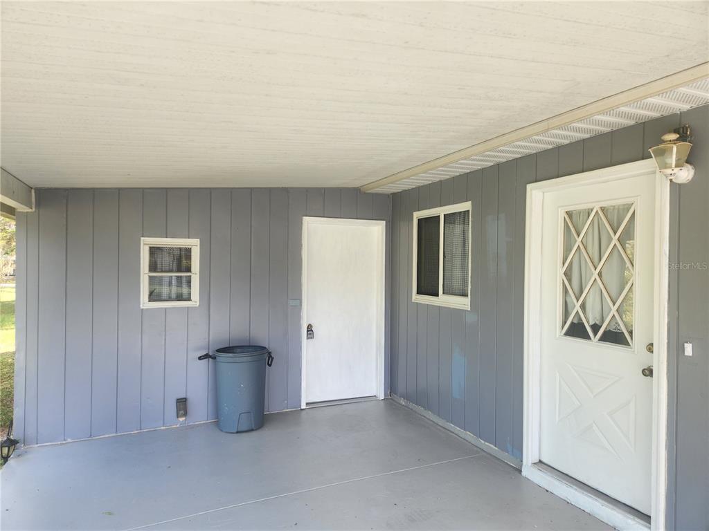 9075 Southwest 104th Lane Ocala, FL 34481 - Photo 11 of 11 a view of an empty room and a window