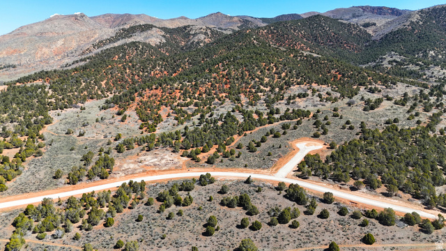 4953 West Cougar Run Road, Unit 20 Fairview, UT 84629 - Photo 6 of 14 Aerial view of a mountainous background