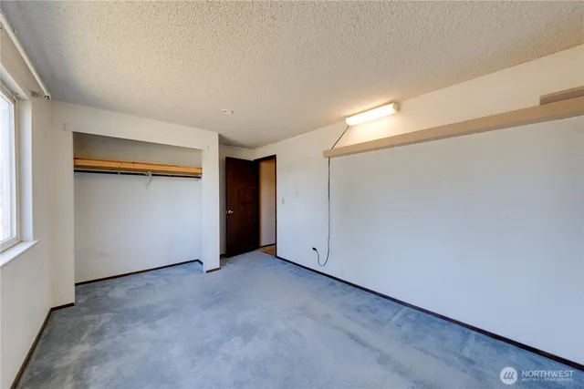 an empty room with closet