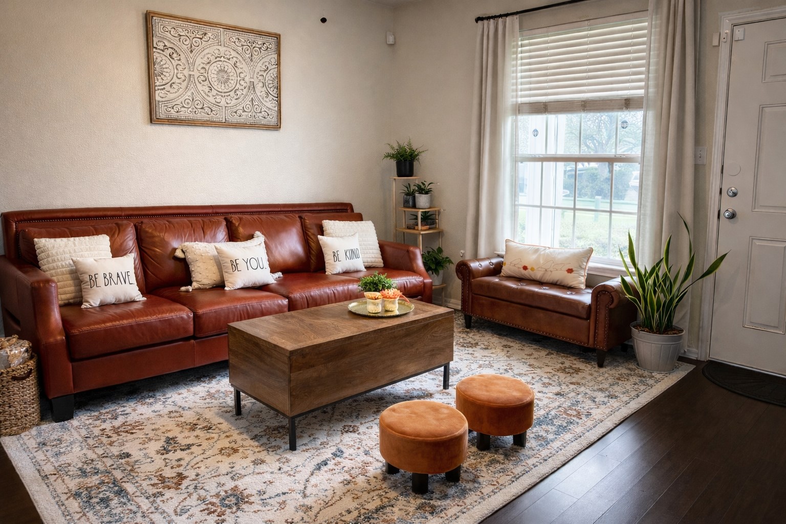 917 Sebastian Bend, Unit B Pflugerville, TX 78660 - Photo 4 of 20 a living room with furniture and a rug