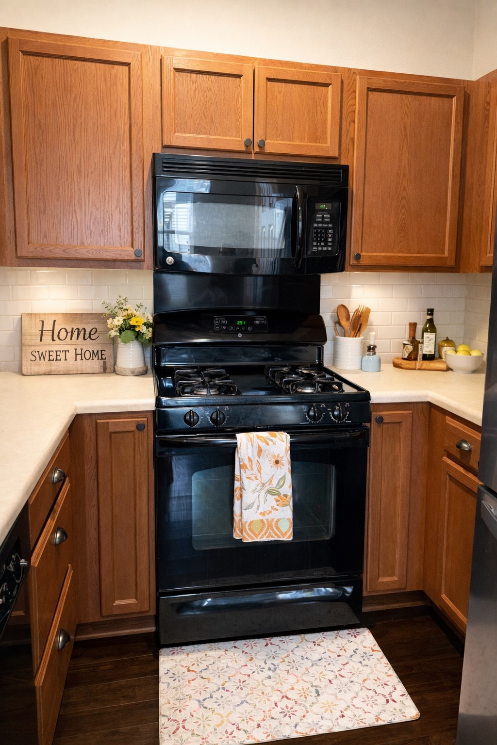 917 Sebastian Bend, Unit B Pflugerville, TX 78660 - Photo 7 of 20 a kitchen with stainless steel appliances granite countertop a stove and a microwave