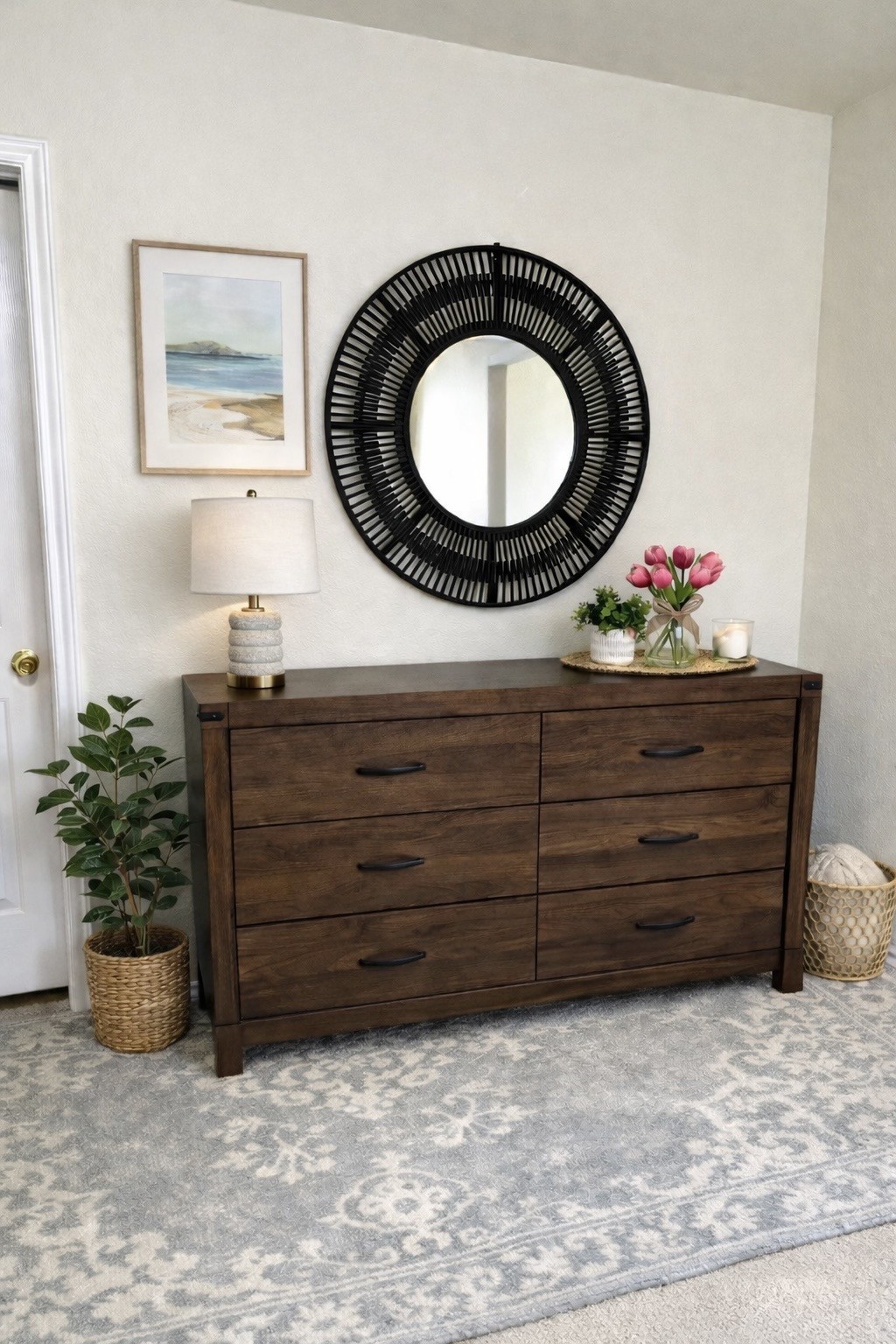 917 Sebastian Bend, Unit B Pflugerville, TX 78660 - Photo 9 of 20 a living room with a dresser and a mirror