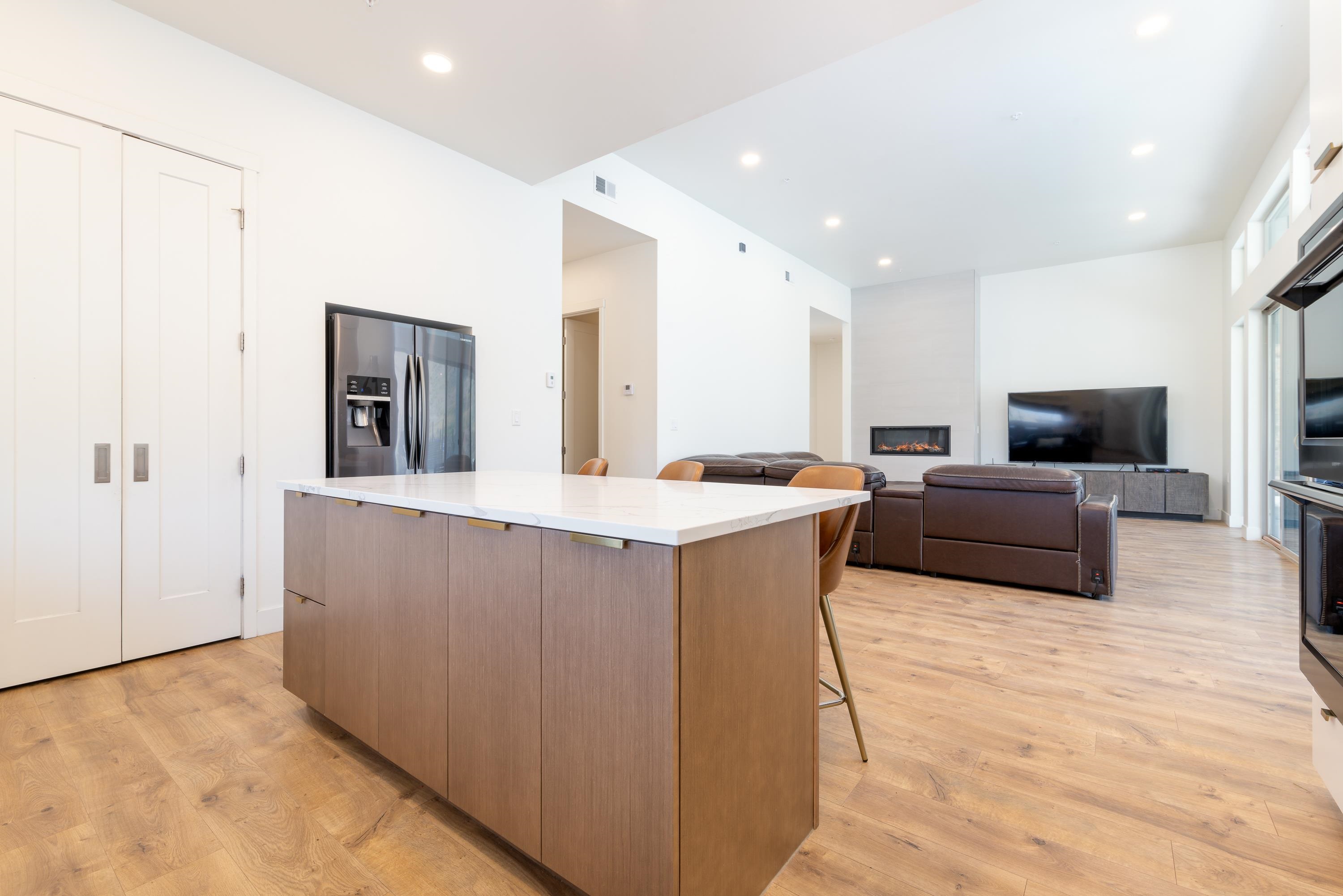 3685 East Road Palisade, CO 81526 - Photo 15 of 42 a living room with furniture and a flat screen tv