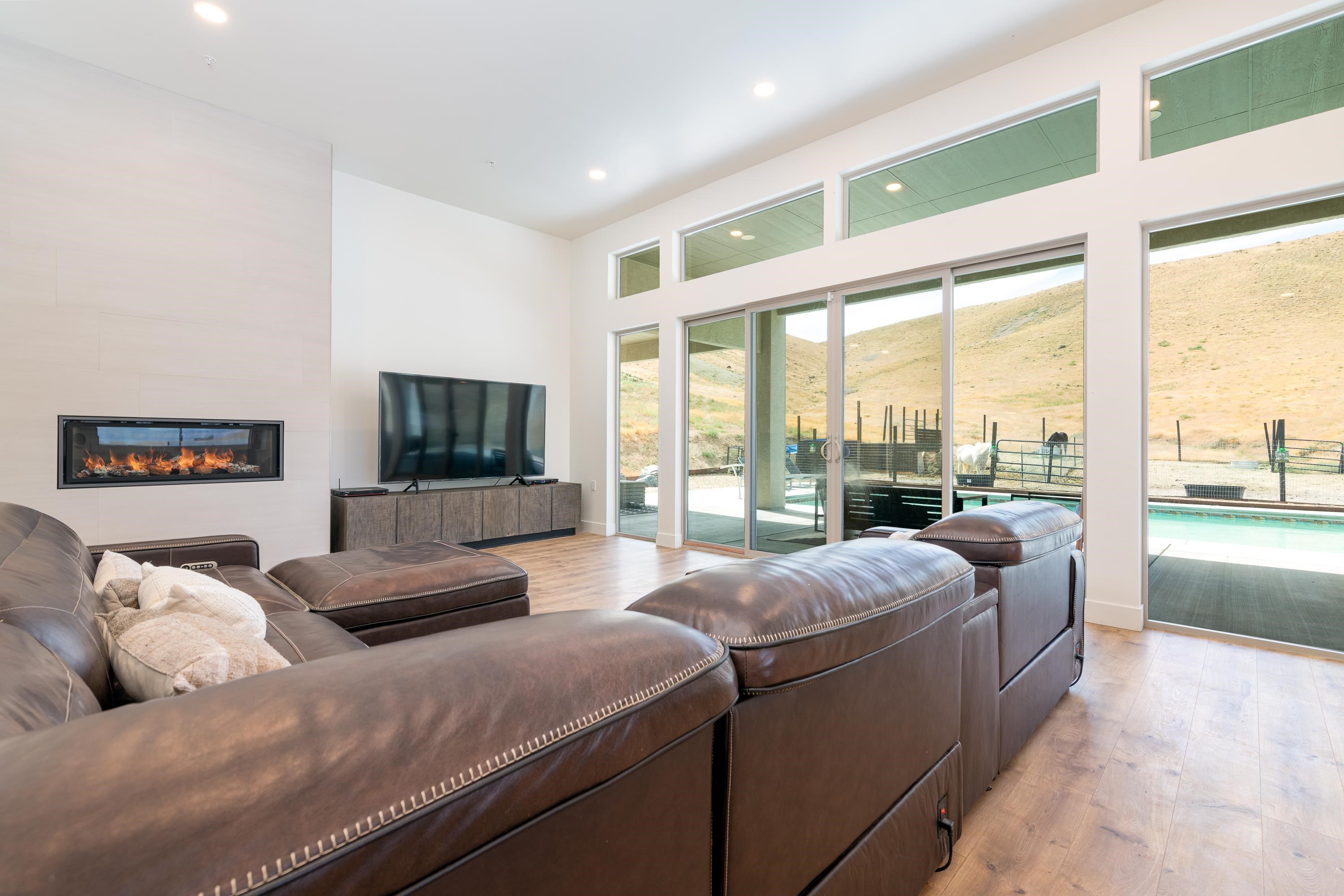 3685 East Road Palisade, CO 81526 - Photo 17 of 42 a bedroom with furniture and a large window