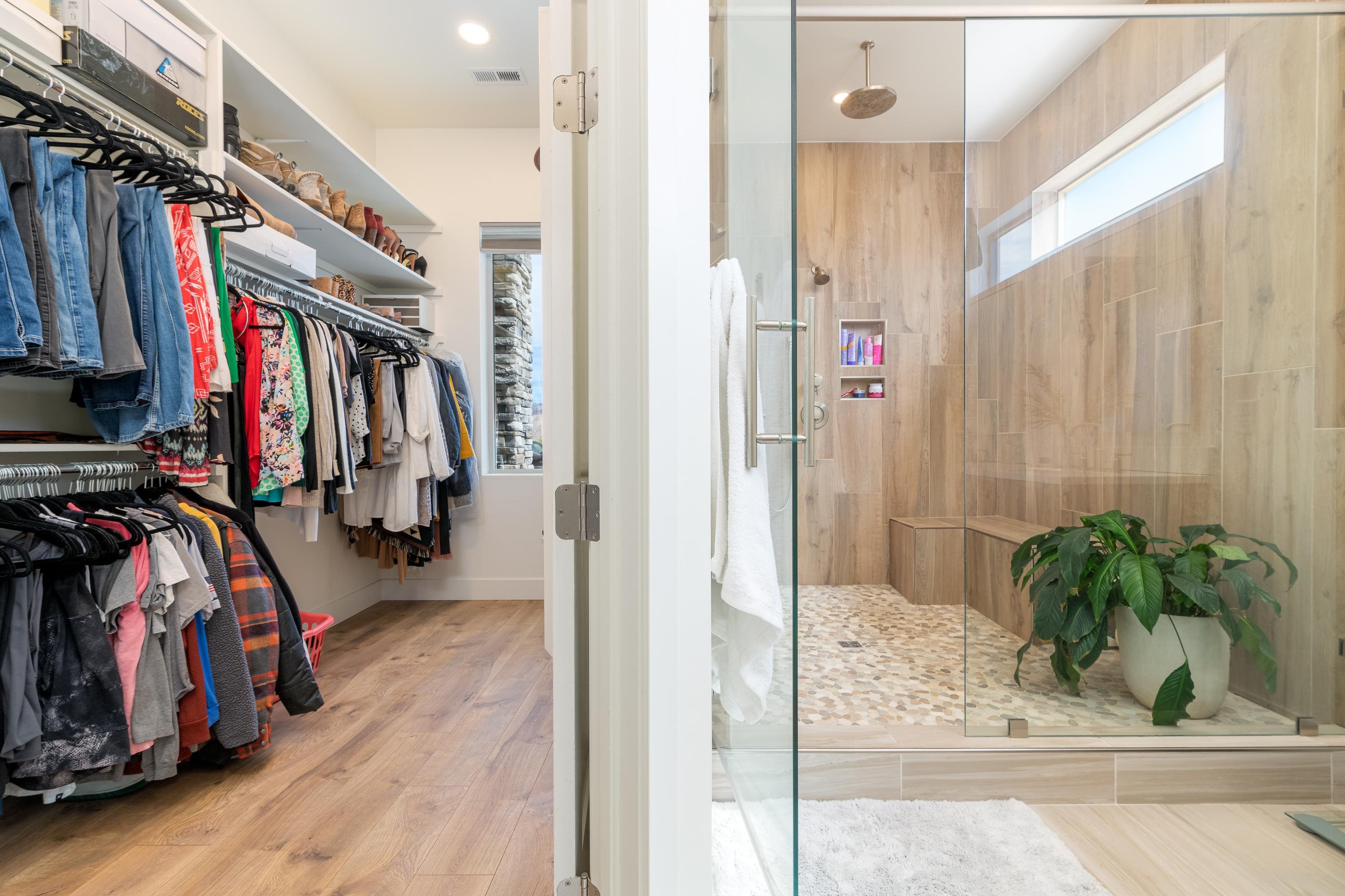3685 East Road Palisade, CO 81526 - Photo 23 of 42 a view of walk in closet with clothes and shoes