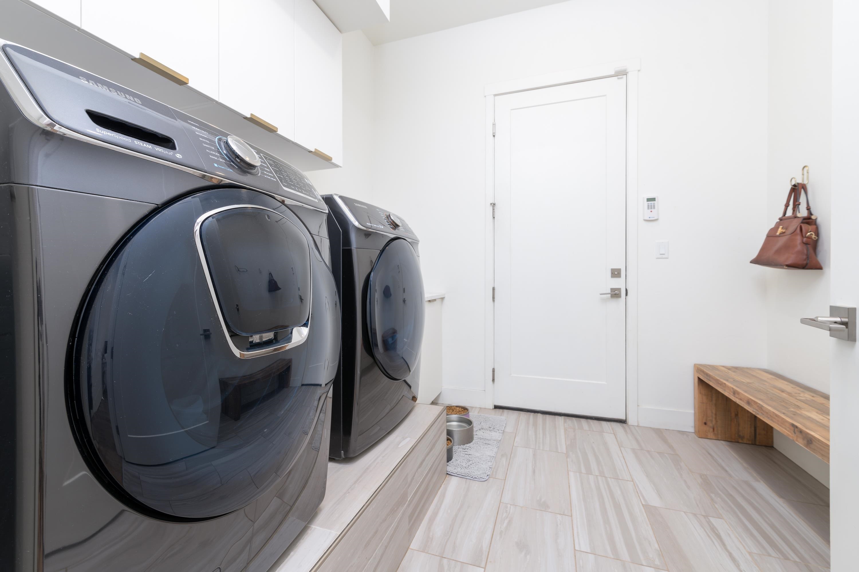 3685 East Road Palisade, CO 81526 - Photo 28 of 42 a utility room with dryer and washer