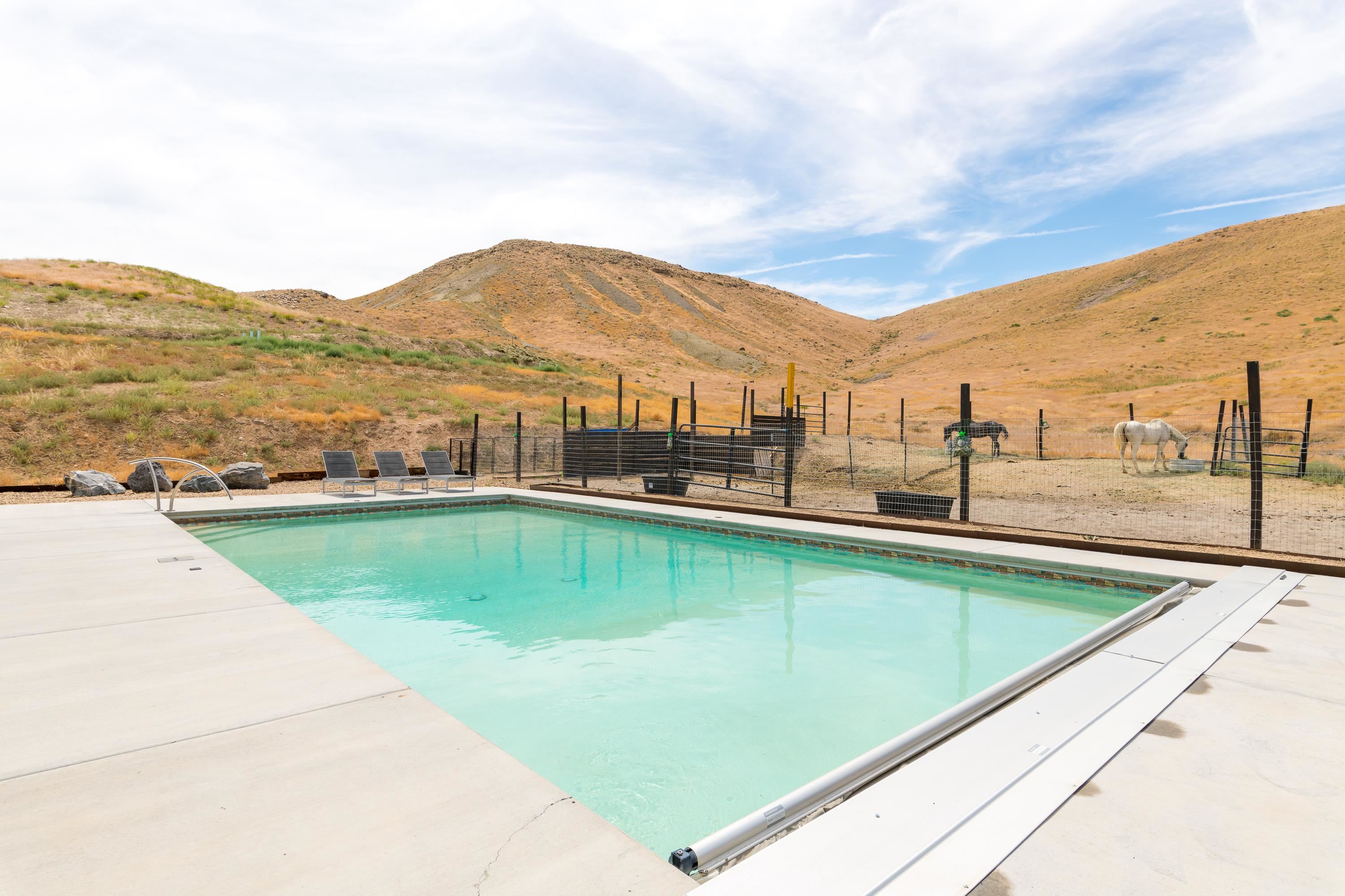 3685 East Road Palisade, CO 81526 - Photo 33 of 42 a view of swimming pool from a balcony
