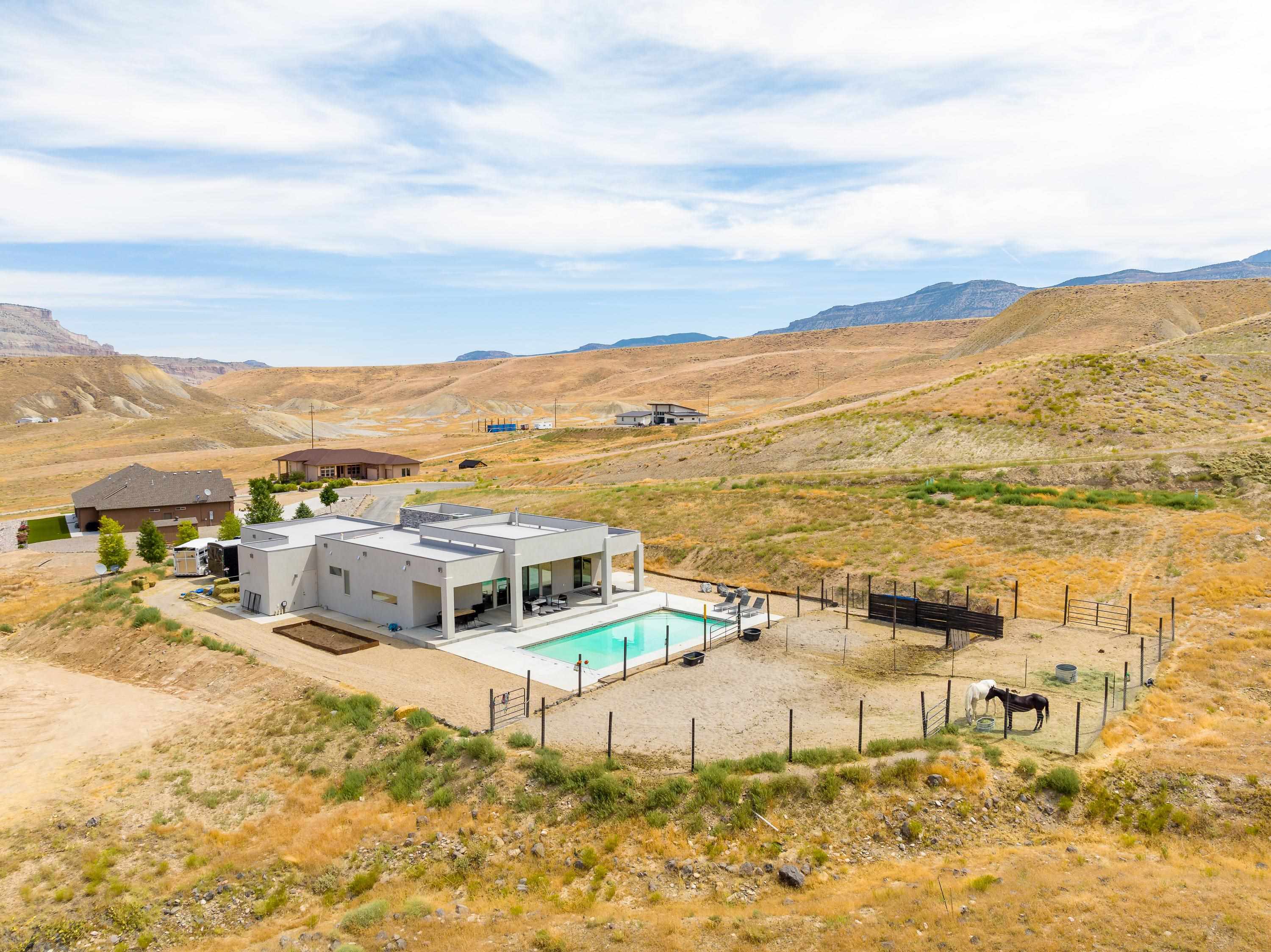 3685 East Road Palisade, CO 81526 - Photo 36 of 42 a view of a city with an ocean beach