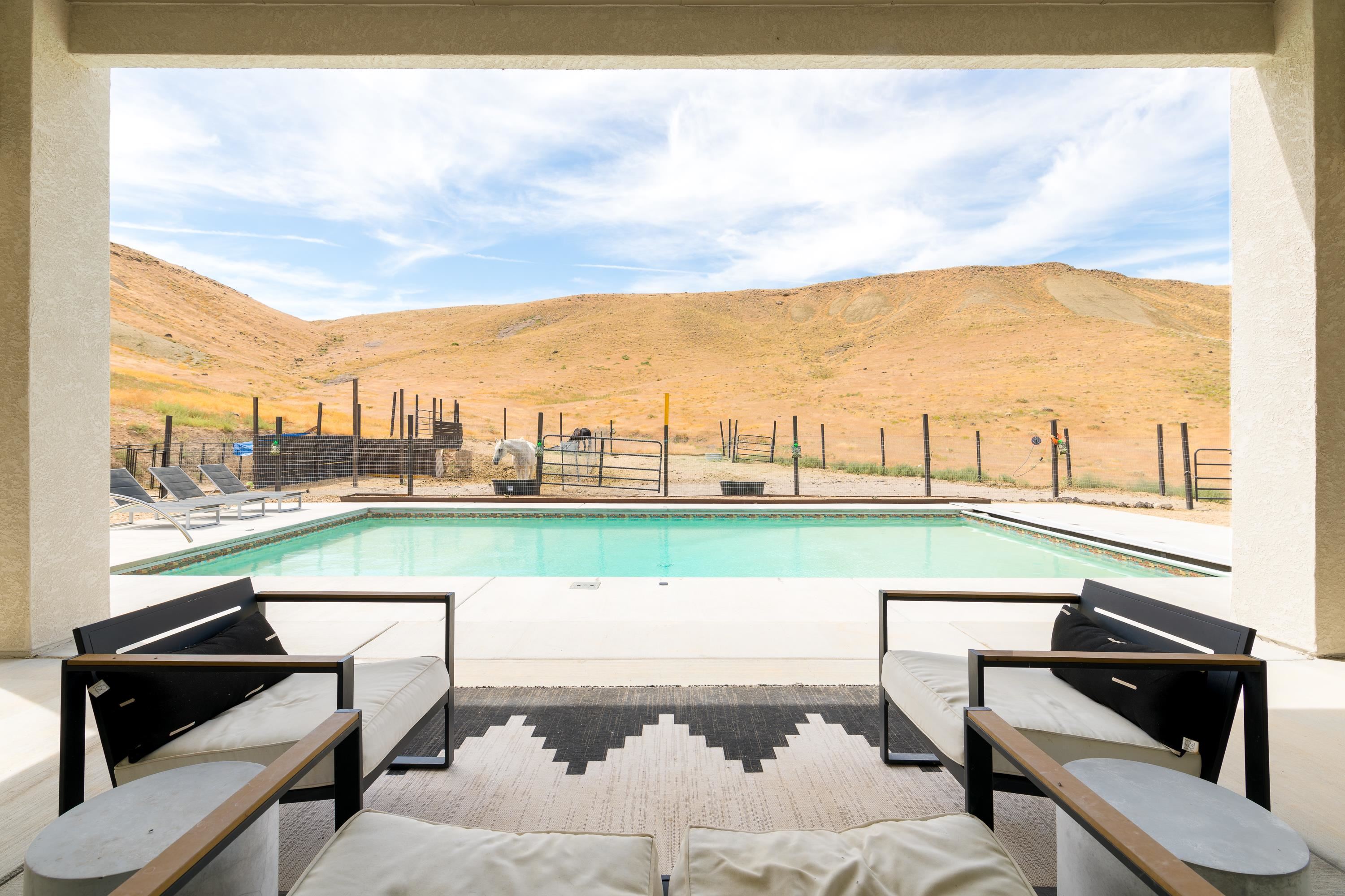 3685 East Road Palisade, CO 81526 - Photo 7 of 42 a view of swimming pool from a balcony