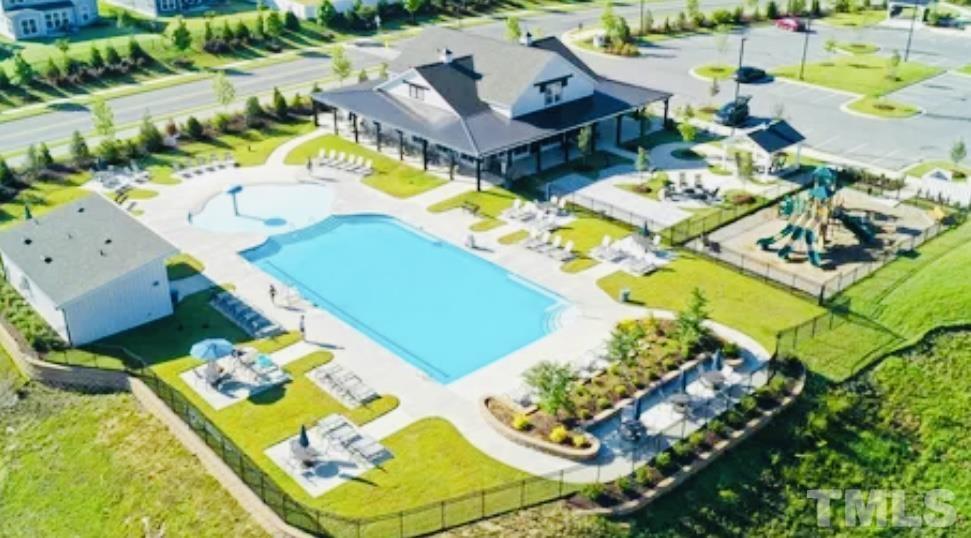 3155 Retama Run New Hill, NC 27562 - Photo 46 of 48 an aerial view of a swimming pool