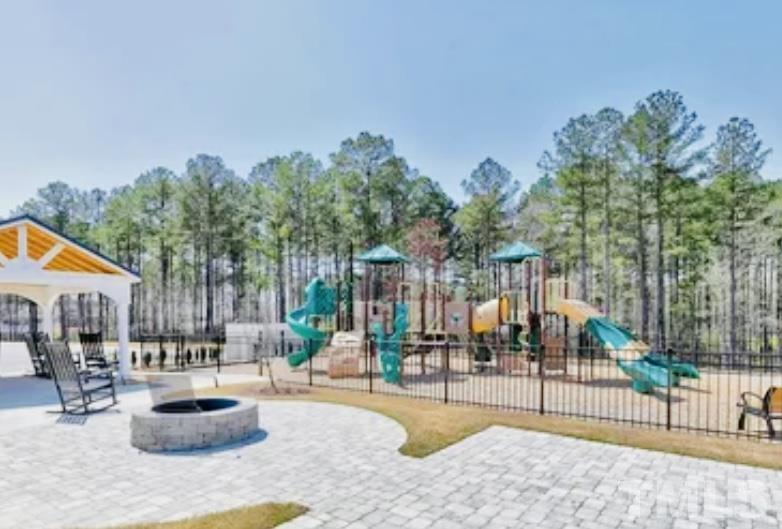 3155 Retama Run New Hill, NC 27562 - Photo 47 of 48 a outdoor space with swimming pool and furniture