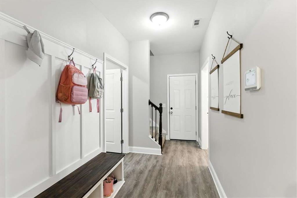 62 Joe Rowell Road Buchanan, GA 30113 - Photo 24 of 63 a view of a room with wooden floor and stairs