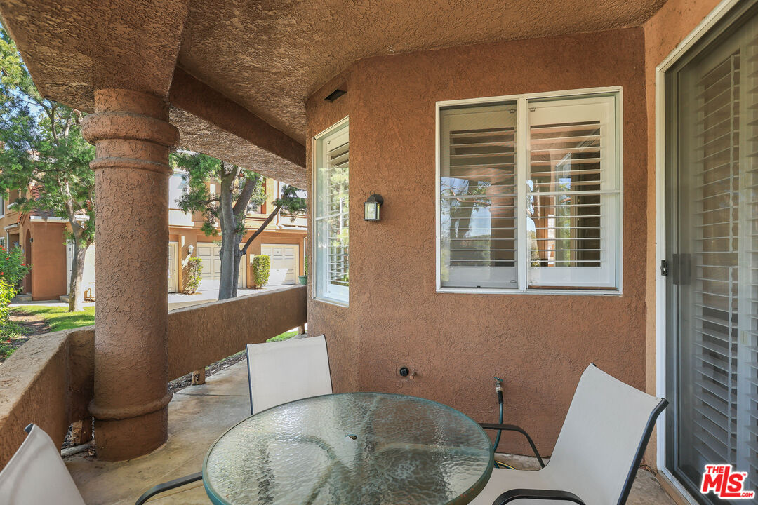 24193 Harbor Ridge Lane, Unit 81 Lake Forest, CA 92630 - Photo 23 of 43 a living room with furniture and a window